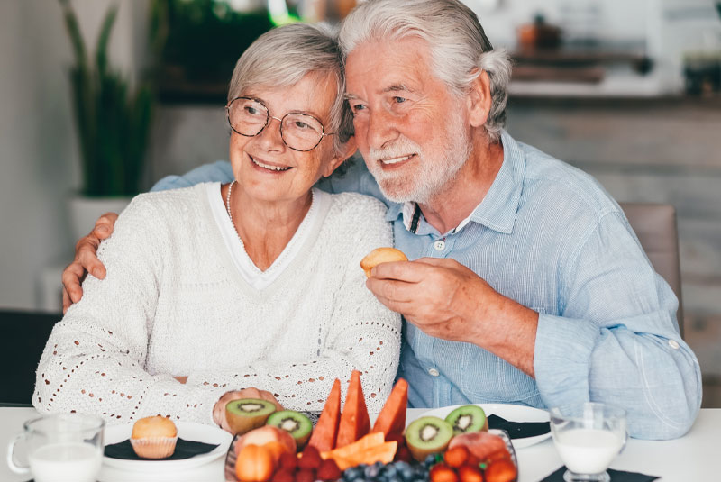 older couple new benefits from stable teeth