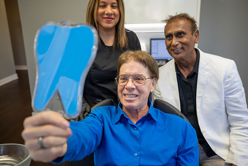 patient smiling brightly after their dental procedure